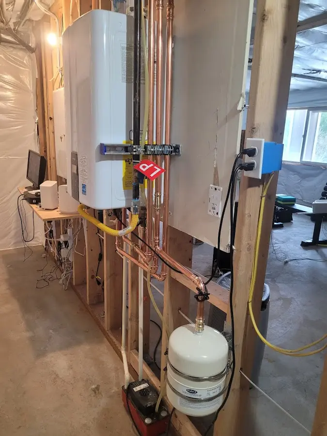 Licensed plumber repairing a kitchen sink in Starkey